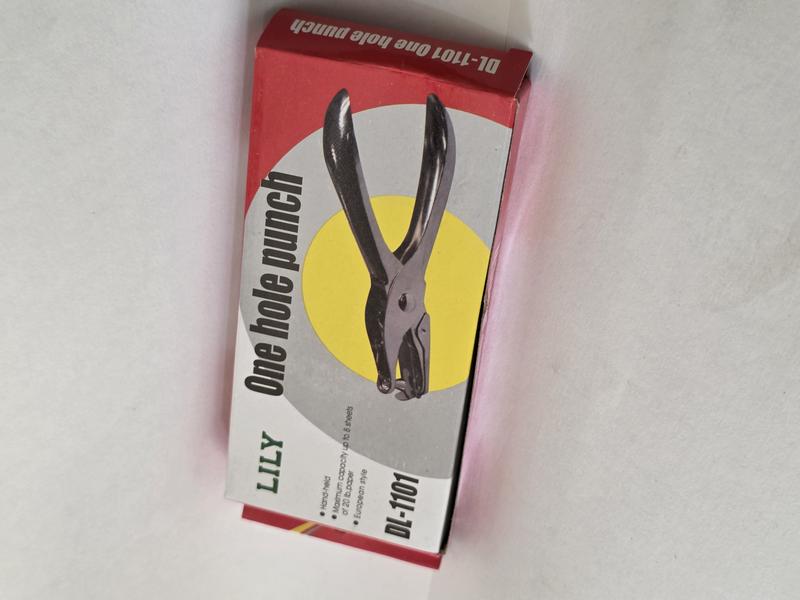 One hole punch